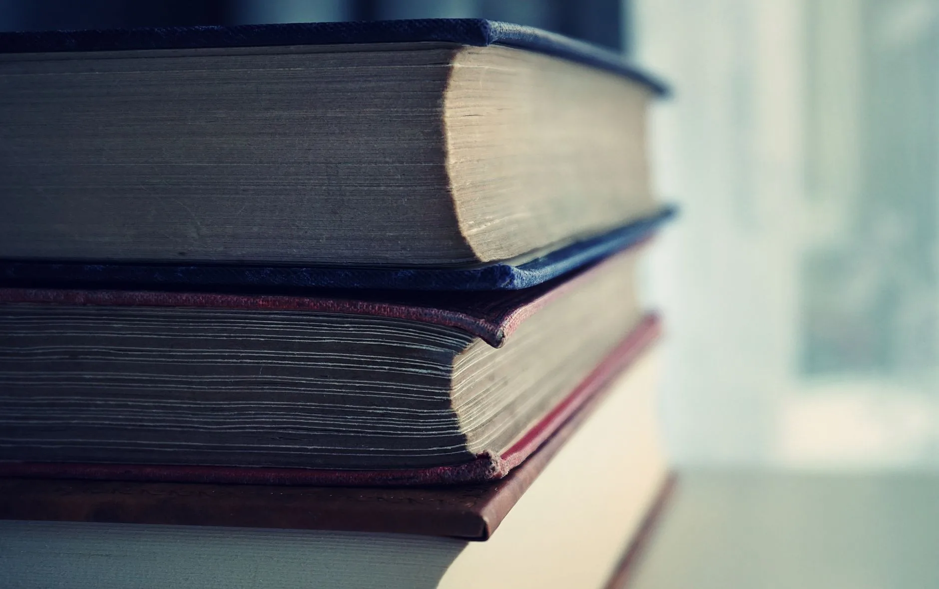 A cozy study with warm wooden panels, inviting audience engagement in short essays.